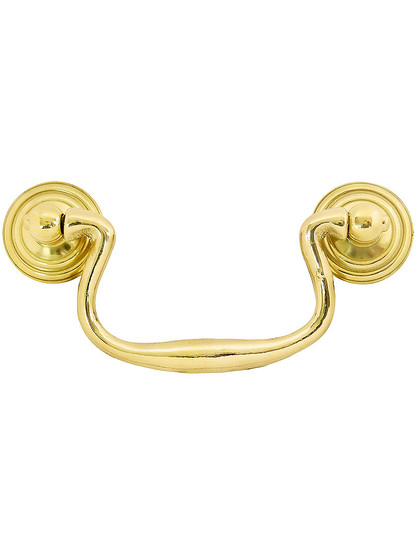 Swan-Neck Brass Bail Pull with Ringed Round Rosettes ‚Äì 3‚Äù Center-to-Center in Unlacquered Brass Finish.